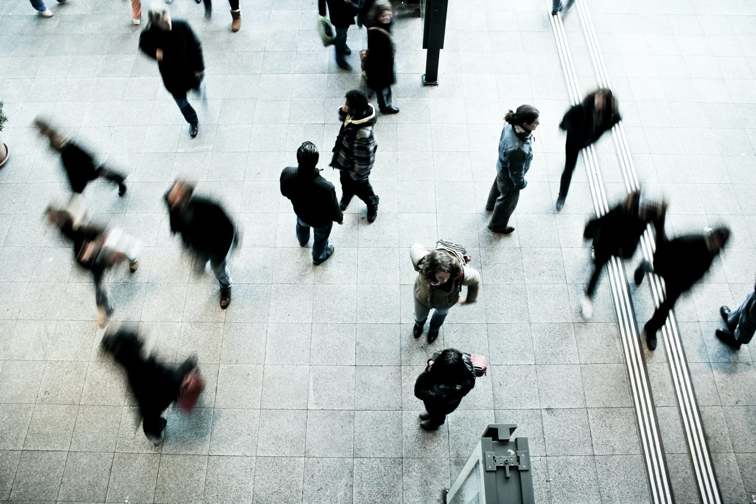 people moving around on street