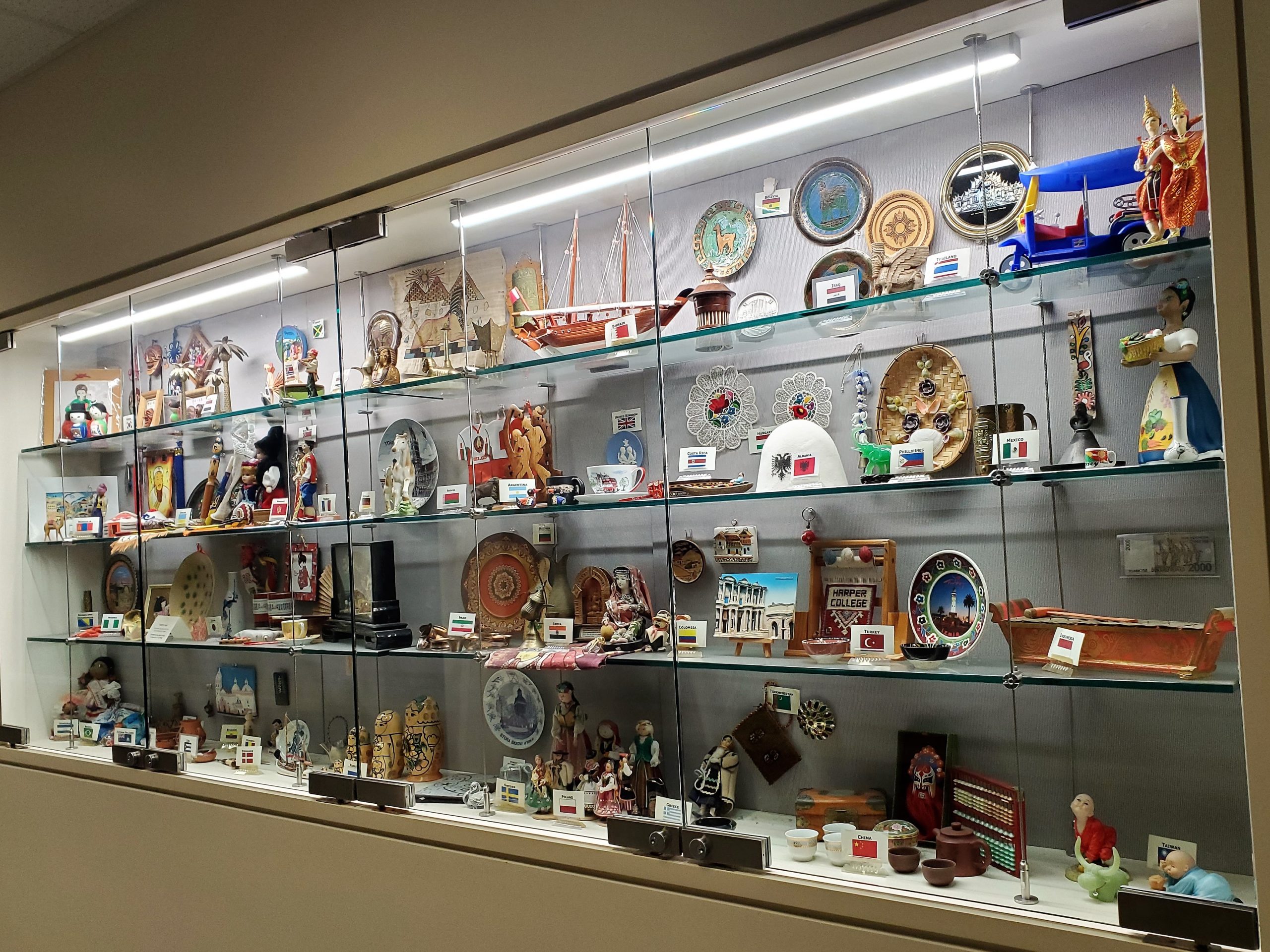 showcase of culture artifacts at entrance of ESL & Linguistics Department at Harper College