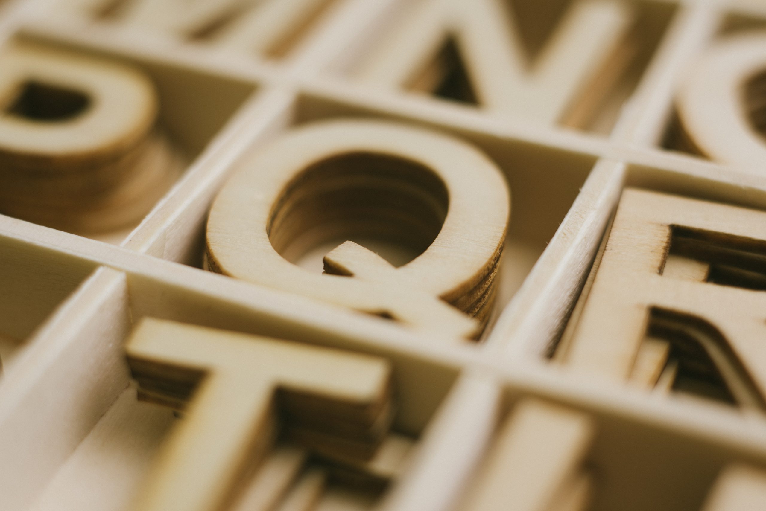 some capital letter cutouts in a box