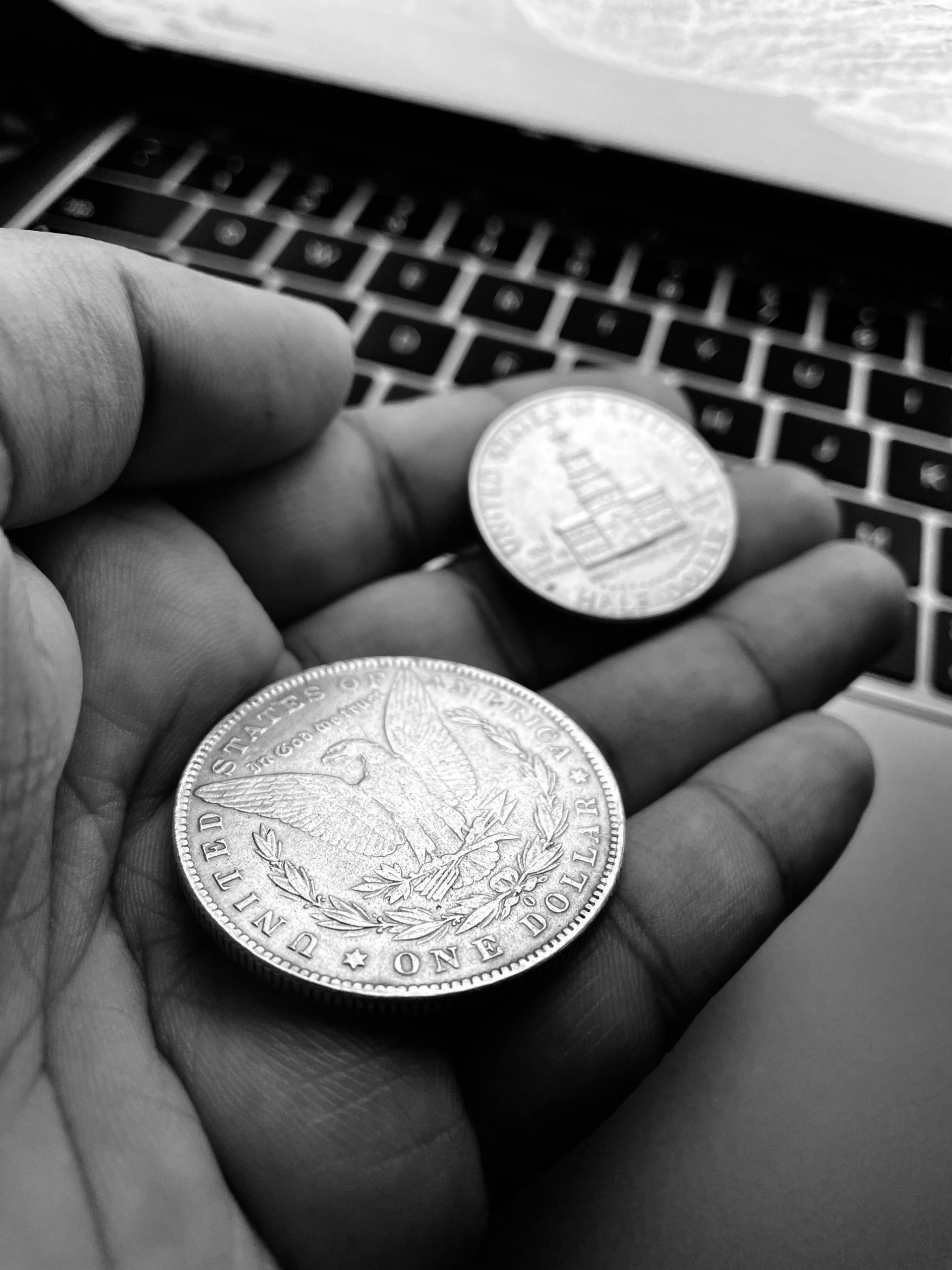 the front and back sides of a U.S. one-dollar coin