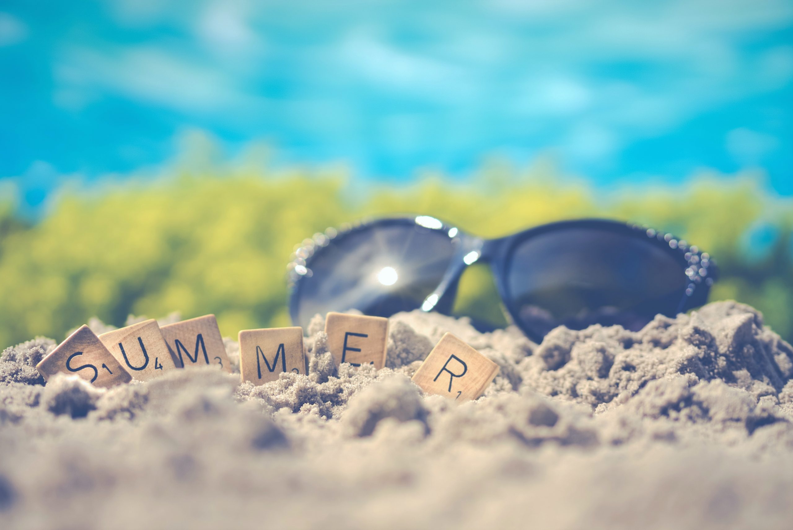 sunglasses on sand