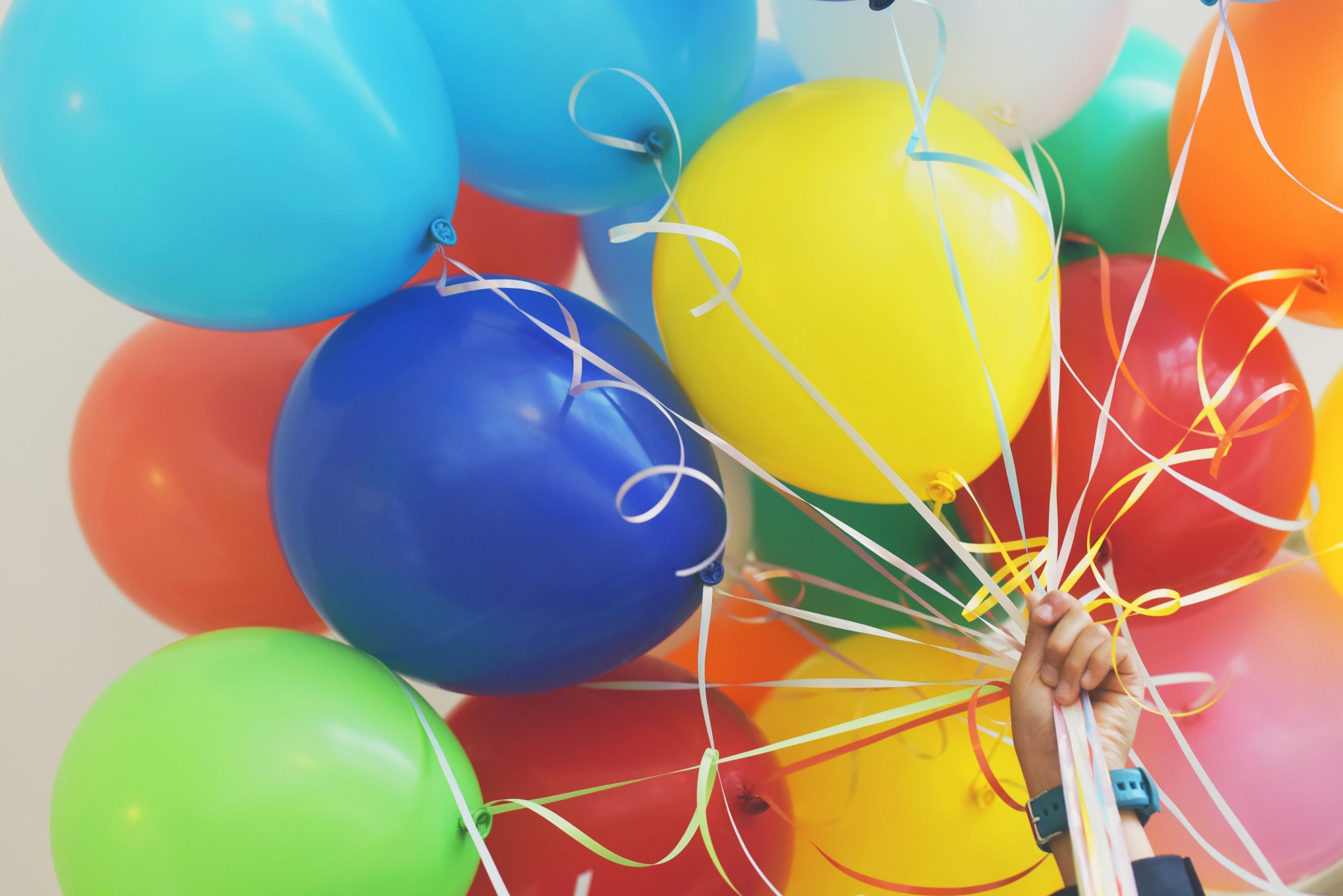 a bunch of colorful balloons