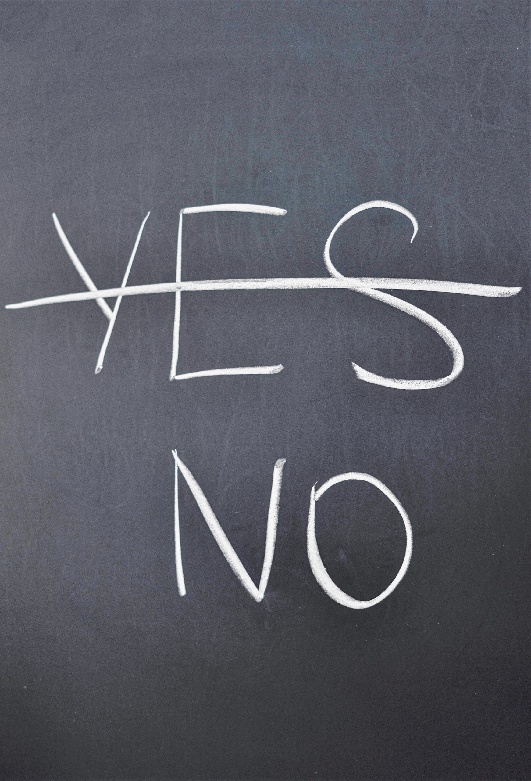 two words "yes" and "no" with "yes" crossed out