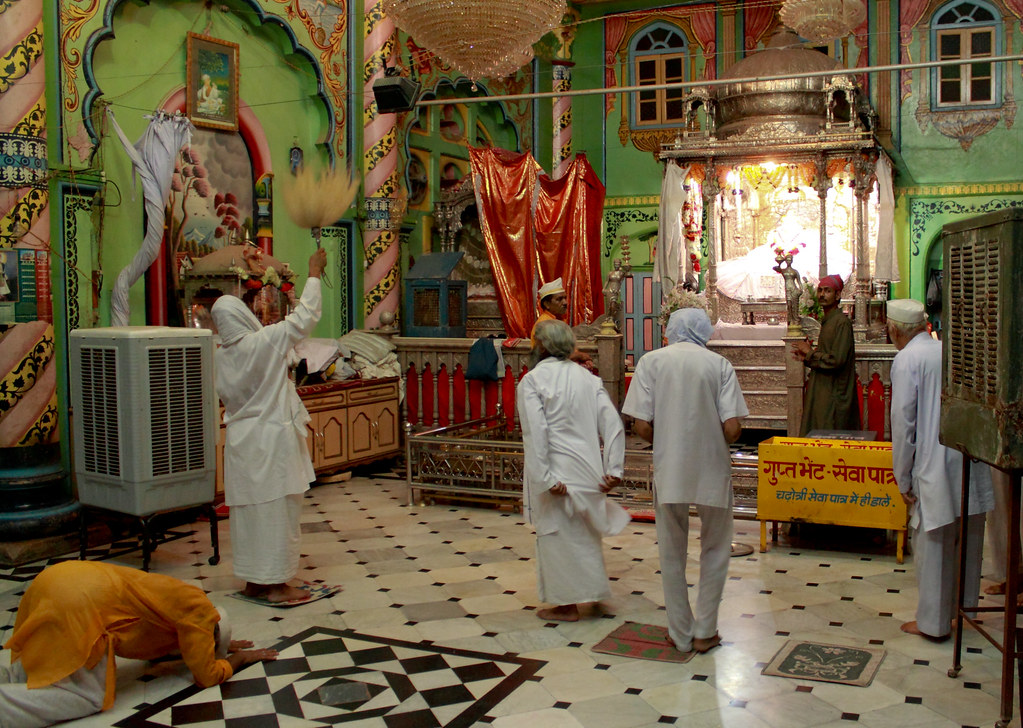 Photo of Hindus worshiping at a temple.